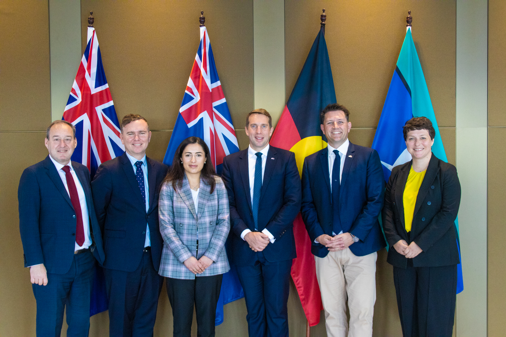 Global Victoria, British Chamber representatives pose for a photo with Martin Kent