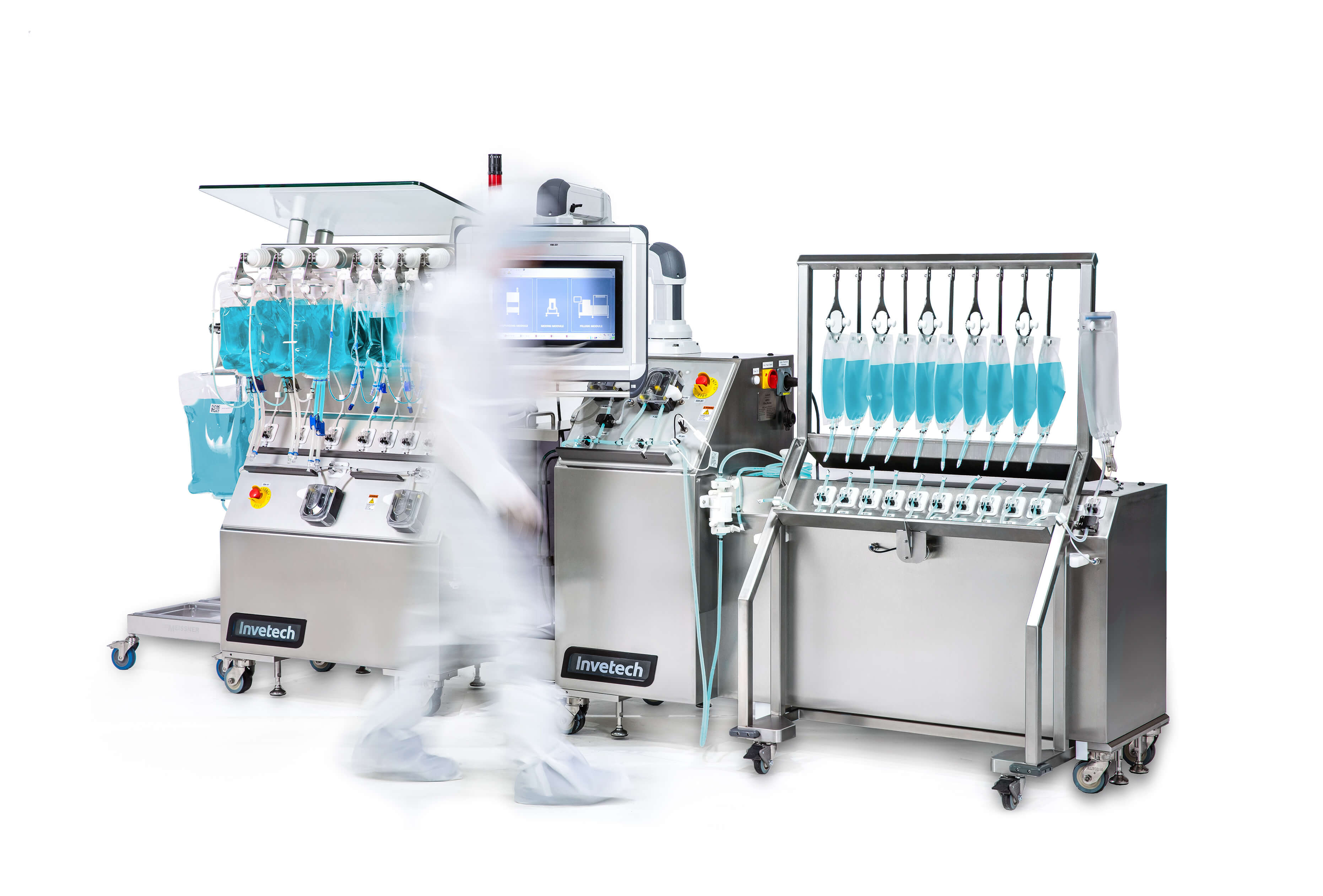 Invetech machinery with a blurred image of a person in lab coat at the machine