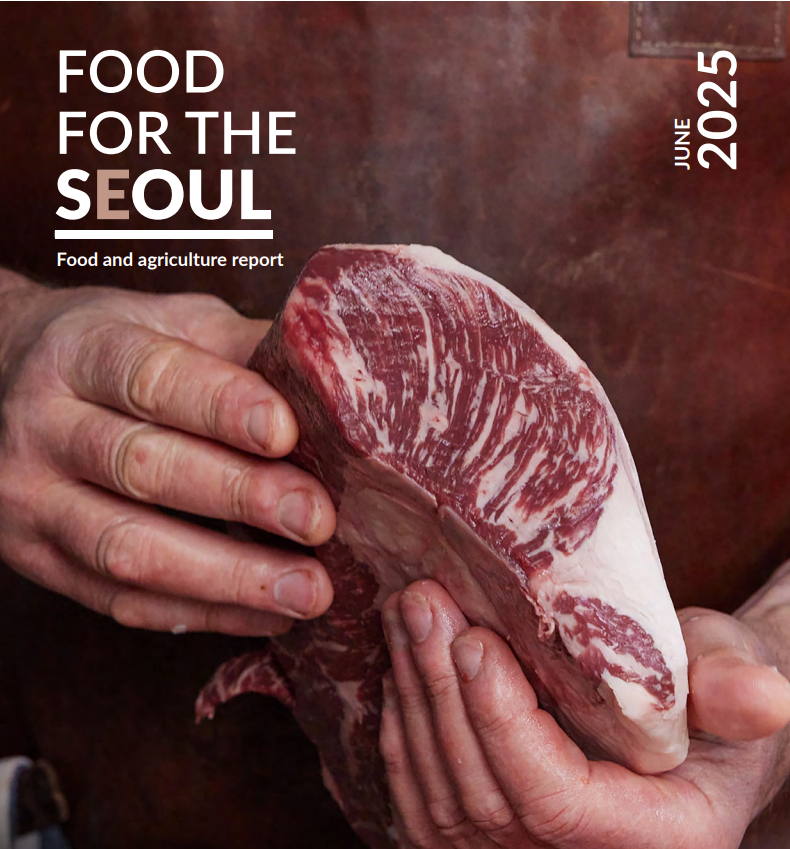Front cover image of the report. A man holds a prized piece of Wagyu beef in between his hands