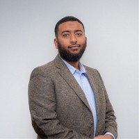 A photograph of Dr. Ammar Al-Ghelani