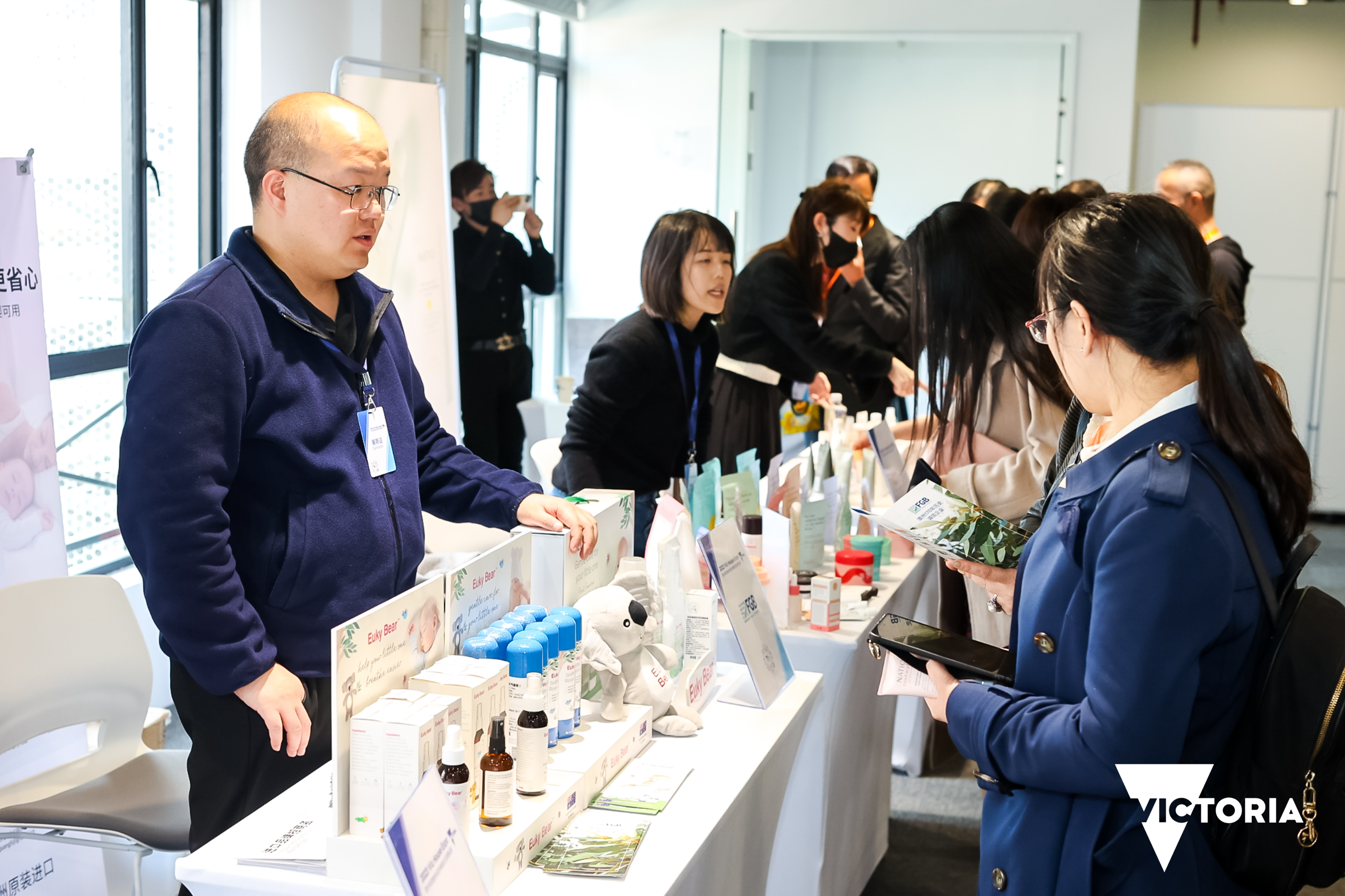 Attendees at Vic House Wellness Lab sample products Victorian beauty and wellness products being showcased