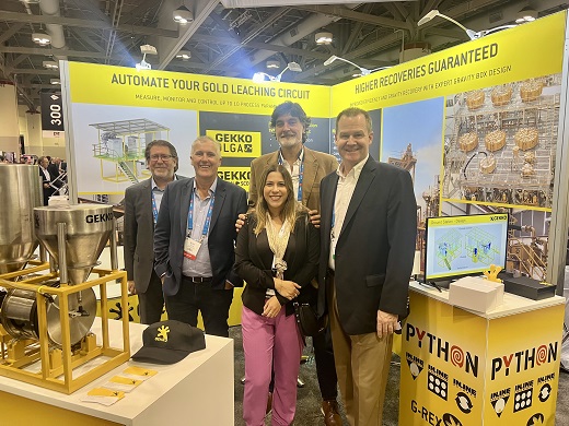 Members from GEKKO and Global Victoria pose in front of the Victorian Government Trade Stand at PDAC in Canada