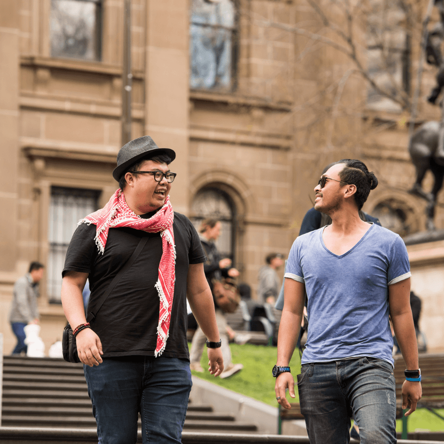 Two students walking at university 